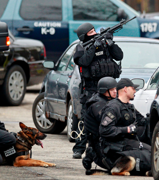 Illustration for article titled Scenes From The Watertown Manhunt